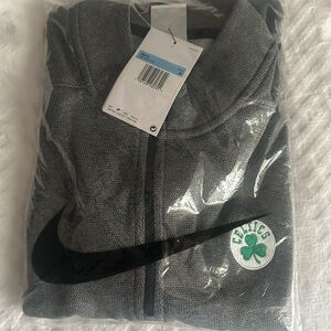 Nike Boston Celtics quarter zip size medium , new in the plastic
